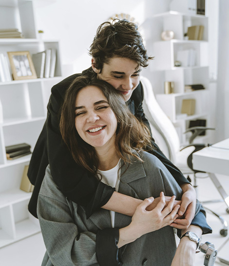 Teenage boy hugging his mother, represents how you can strengthen your connection with the support of a children & teen therapist in Montclair, NJ.
